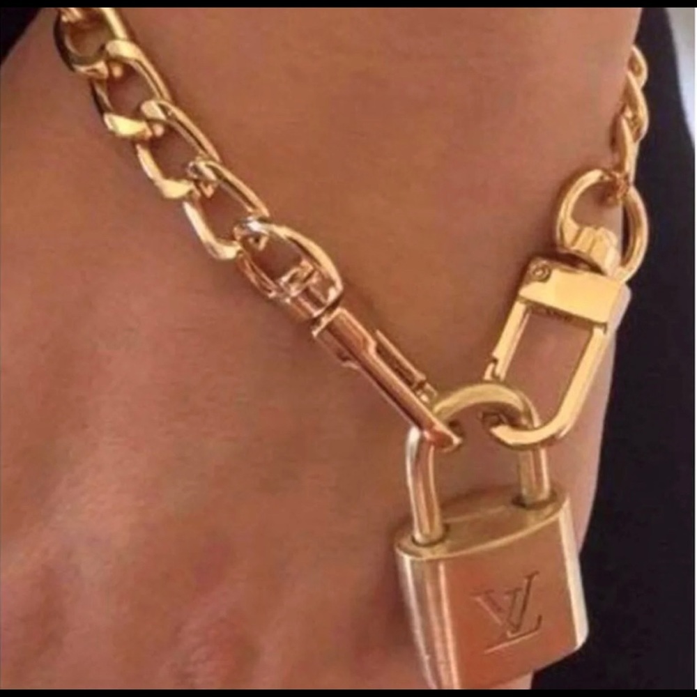 Authentic Louis Vuitton Lock & UA Bracelet